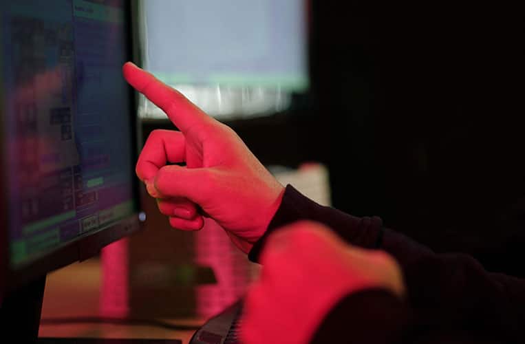 pointing-at-a-computer-screen